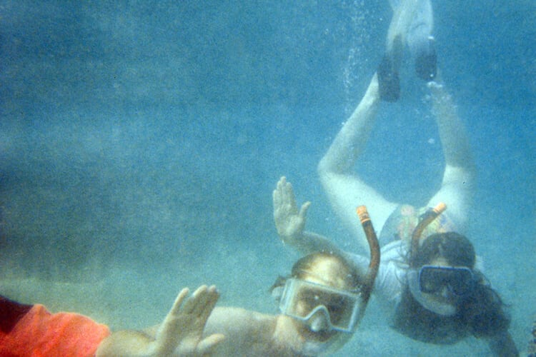 Scuba Diver Finds Camera Underwater