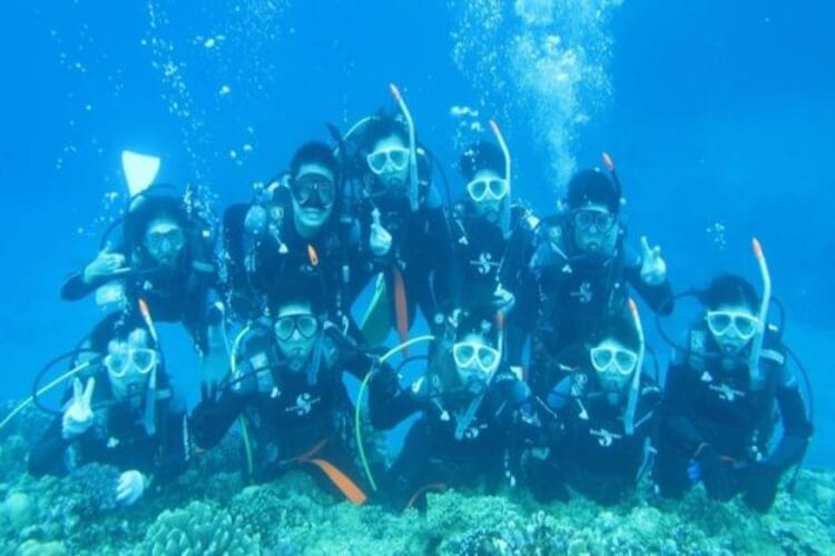 Scuba Diver Finds Camera Underwater