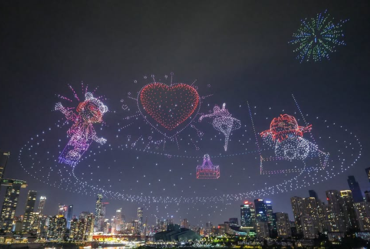 Drone light show over city